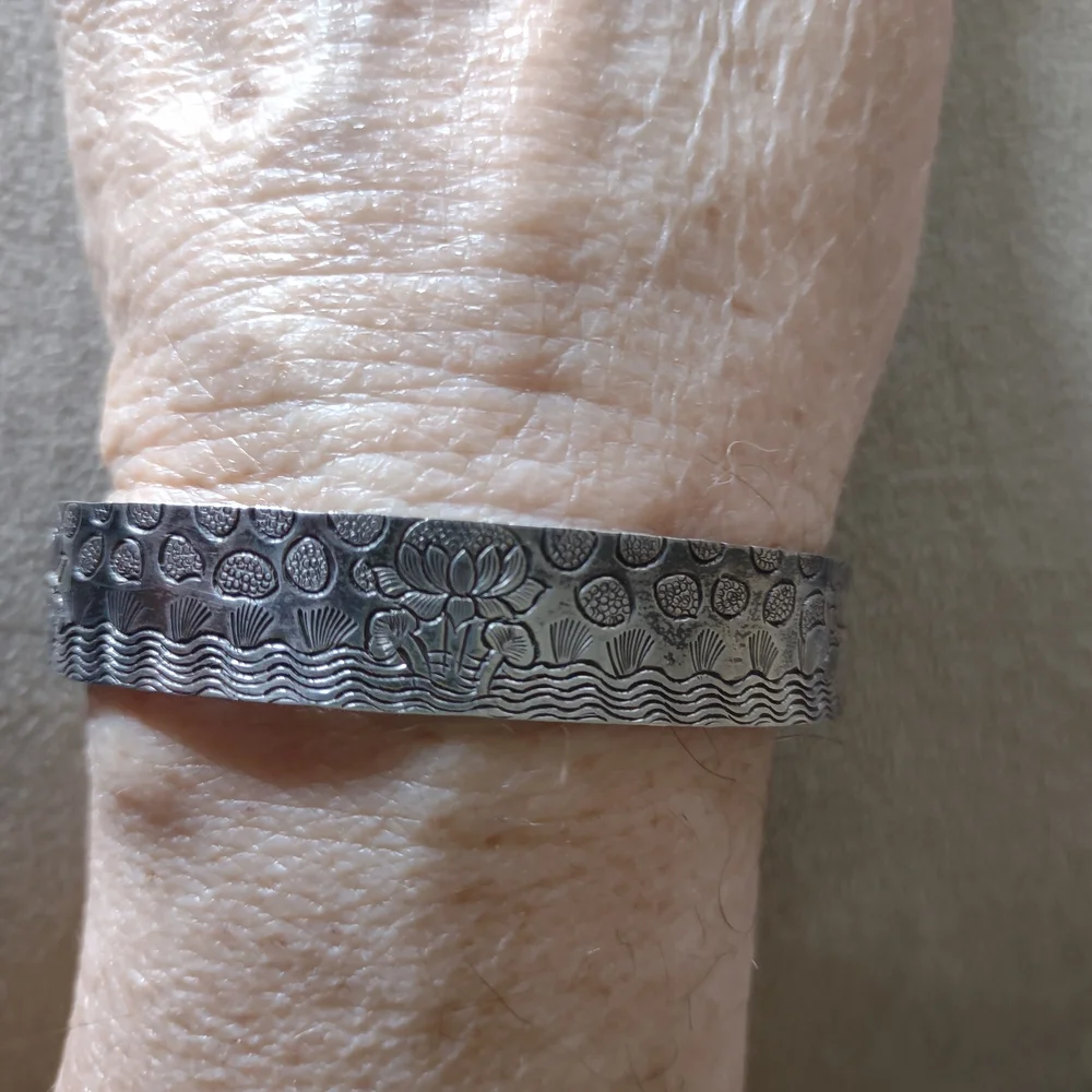 Vintage Silvertone Bracelet With Engraved Floral Accents